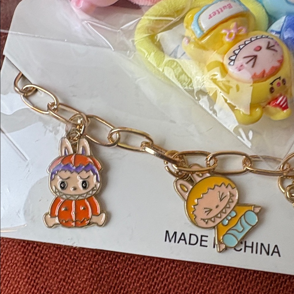 Monster Charm Bracelet & Hair Bands 6 pcs with colorful little monster charms - Picture 2 of 4